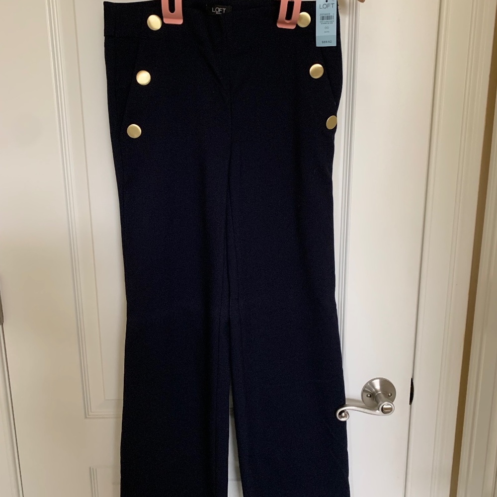 Wide leg navy pants with brass buttons